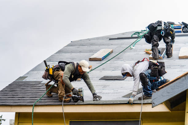 Professional Gutter Installation technician working in Wrightsville Beach, NC